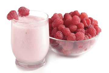 raspberries and yoghurt as tasty dairy dessert