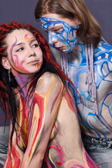 Boy and girl with body painting.