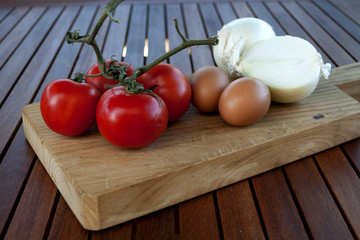 tomatoes, eggs and onions