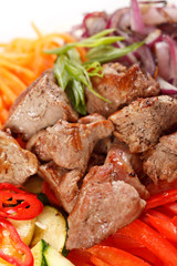 meat with vegetables and noodles