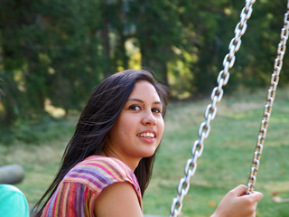 cute girl on the swing