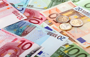 Obraz na płótnie Canvas Euro banknotes and coins