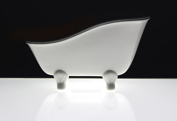 white bath on black background