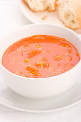 Vegetable Soup with bread on a plate.