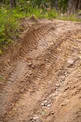 Tire tracks prints in sand on a 4x4 track