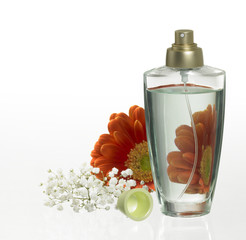 perfume bottle and floral decoration