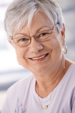 Closeup portrait of smiling senior lady