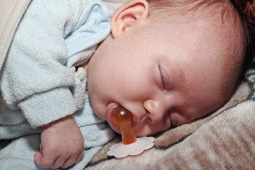 sleep with a pacifier