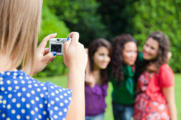 Girl Taking Photos to Her Friends