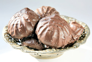 Marshmallow in a chocolate in the bowl