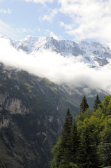Clouds and peaks at head of valley near Murren in Swiss Alps