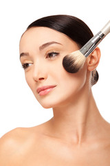 Beauty woman face with brush