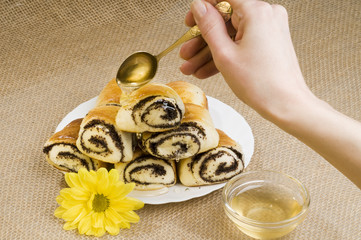 Sweet bun with poppy-seed and honey.