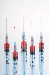 Syringes with blood drop