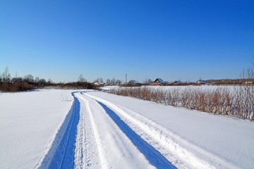 snow road near winter of the villages