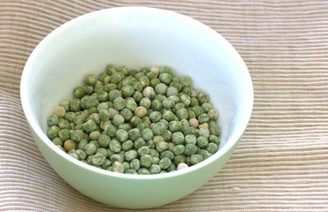 Dry green pea on white background