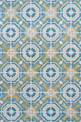 Greenish and yellow pattern made of tiles