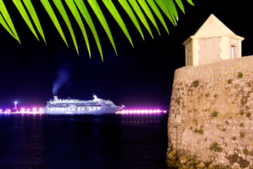 Ibiza night town cruise ship lights and tower