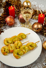 Fototapeta na wymiar shrimp kebab on Christmas table