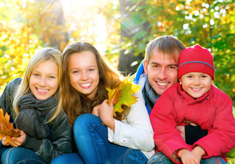 Fototapeta premium Happy Big Family With Kids Walking in Autumn Park