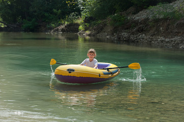 Girl in inflatable boat