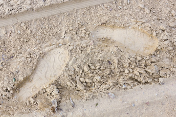 Traces of man's shoe on the sand