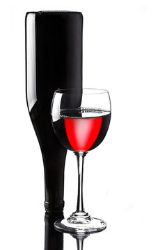 Wine in glass with bottle