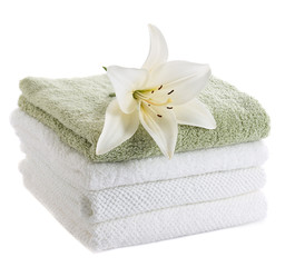 Obraz na płótnie Canvas towels with white lily