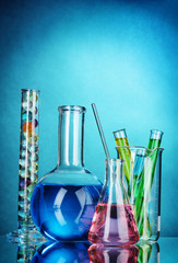 Test-tubes on blue background