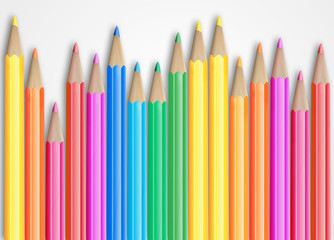 Set of coloured pencils with shadow on white background