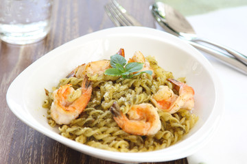 Pasta with pesto sauce and prawn