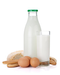 Milk bottle, glass, bread and eggs