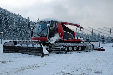 Red snowgroomer