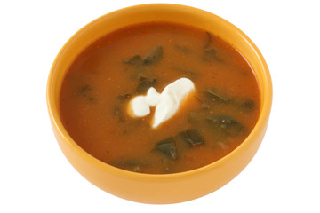 Spinach soup in yellow bowl