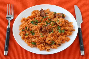 Rice with seafood and sausages