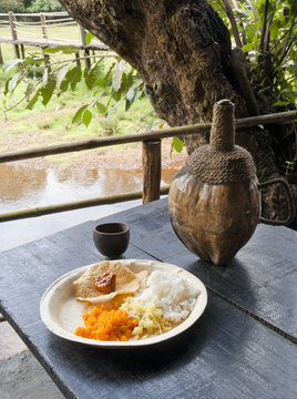 Traditional goan food: rice and fenny drink