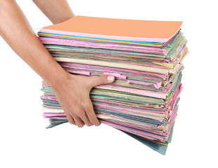 man holding stack of folders Pile with old documents and bills
