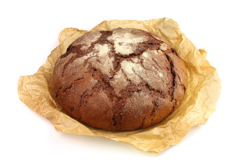 Home-made bread in a pergament paper