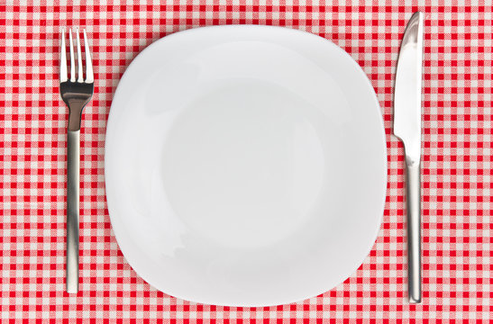 Dinner setting with plate, fork and knife