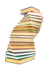 a large stack of books on white background