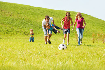 Obraz premium Excited parents with kids