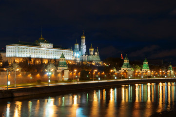 Moscow Kremlin and river under night sky