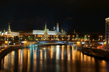 Fototapeta na wymiar Moscow Kremlin and river under night sky