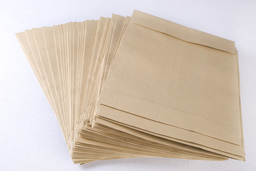 Pile of envelopes over white background. Not isolated.