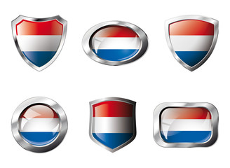  set shiny buttons and shields of flag with metal frame - vector