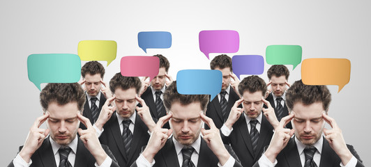 Group of businessmen with speech bubbles