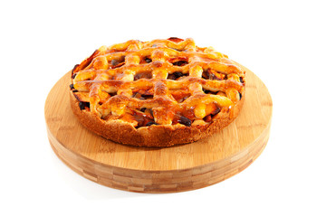 Delicious home baked apple pie over white background