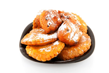 Plate with Dutch donut and apple turnovers