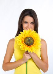 portrait of a beautiful young female with a sunflower