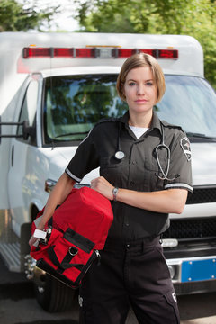 EMS Professional Woman with Oxygen Unit